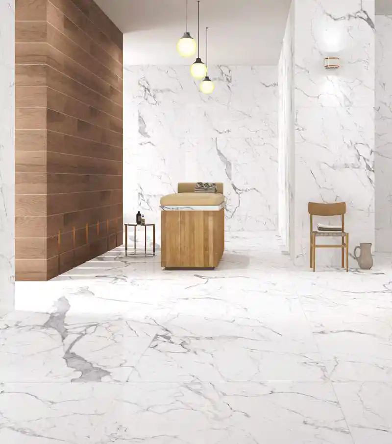Statuario marble slab with bold grey veining on white surface